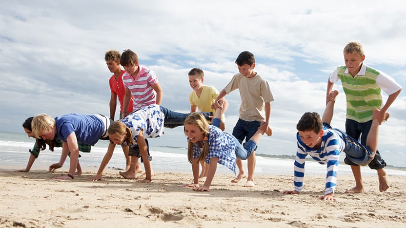 Kids doing Wheelbarrow exercise